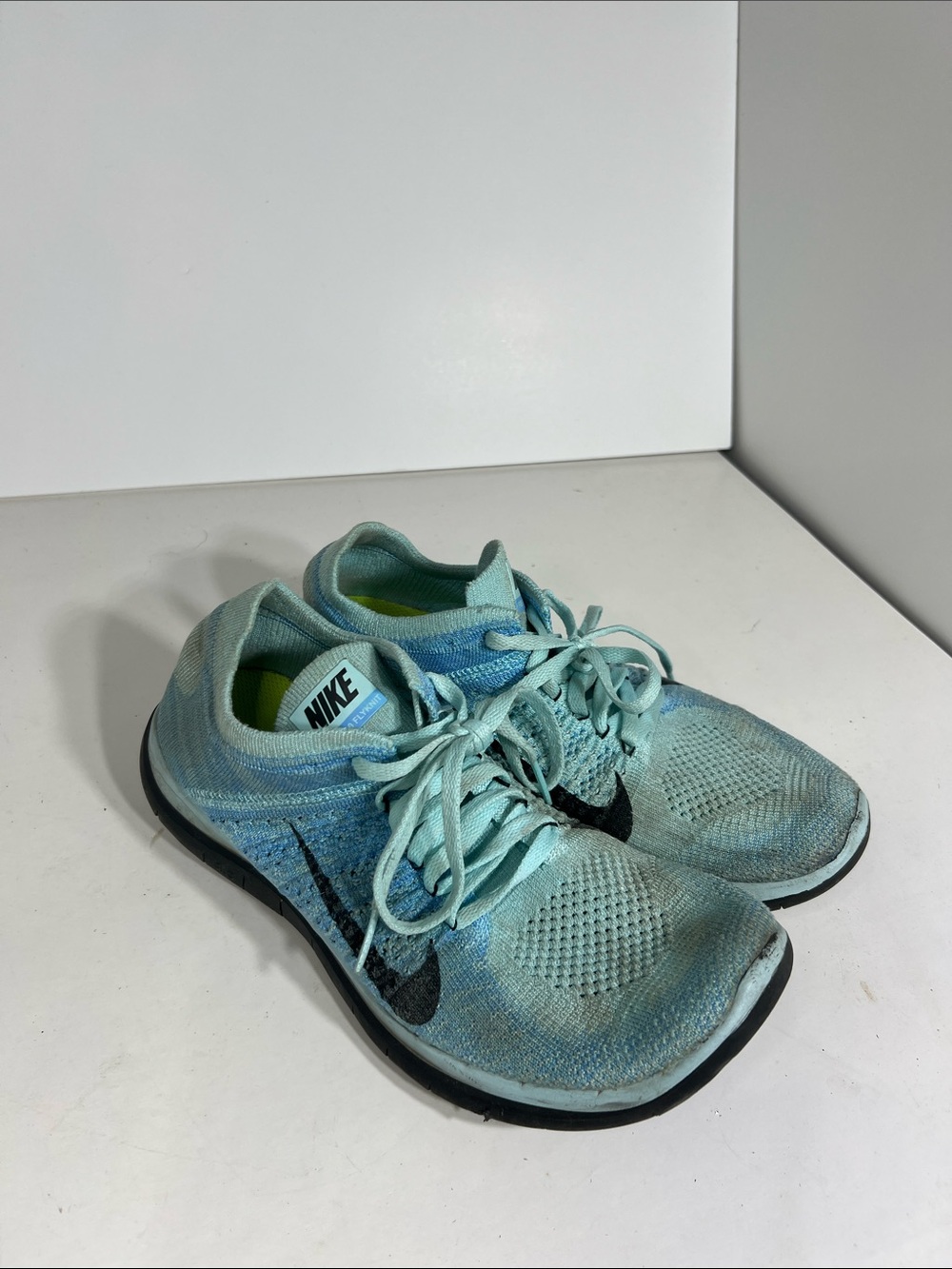 Nike Women's Mint Blue Knit Sneakers with Black Swoosh